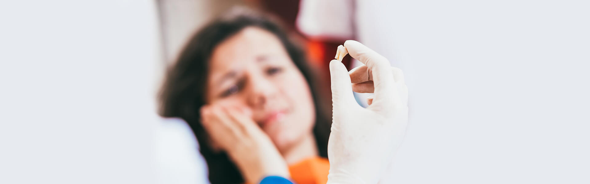 How Much Time Do You Need after Tooth Extractions to Become Pain-Free?